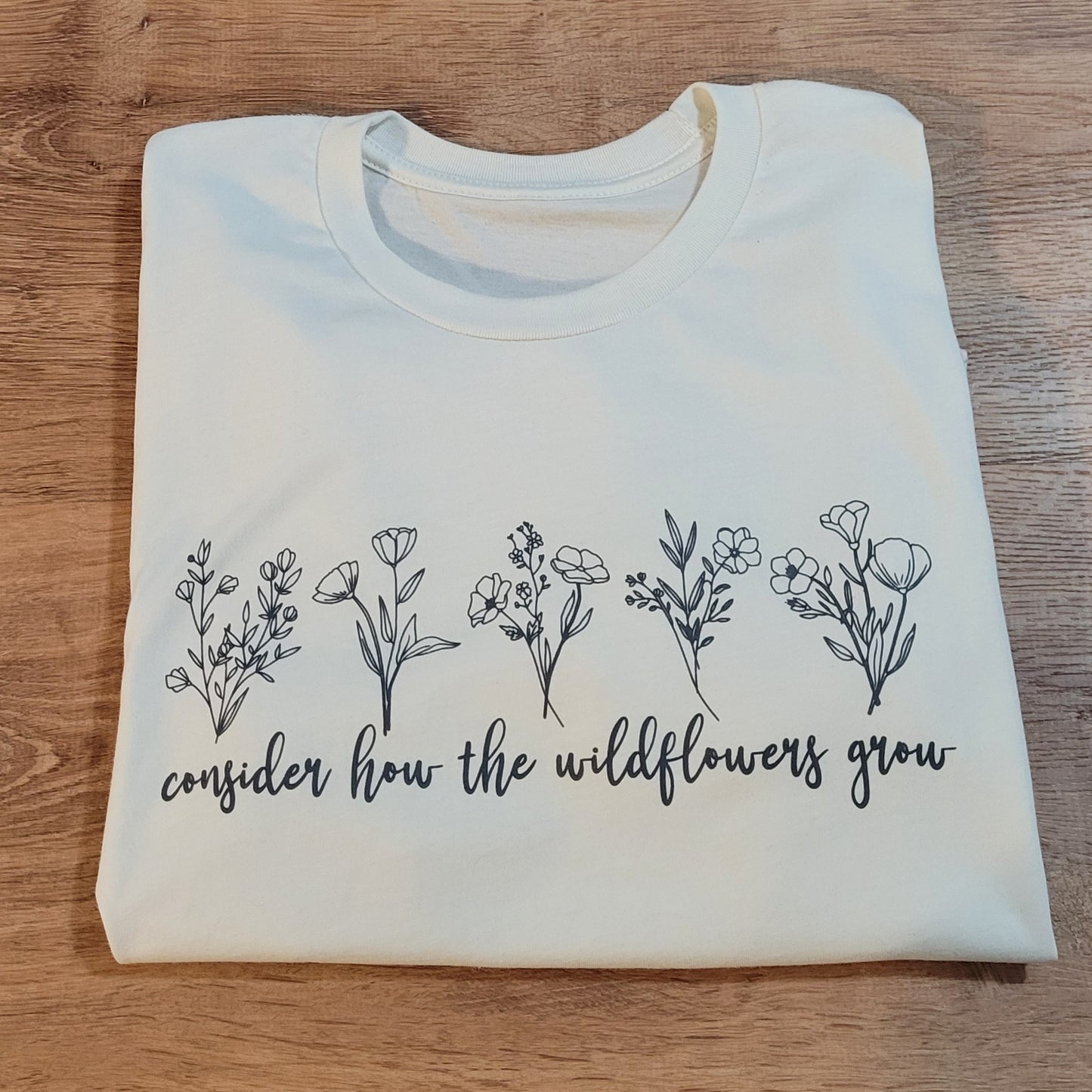 Consider How the Wildflowers Grow Women's T-Shirt . Christian Faith Apparel