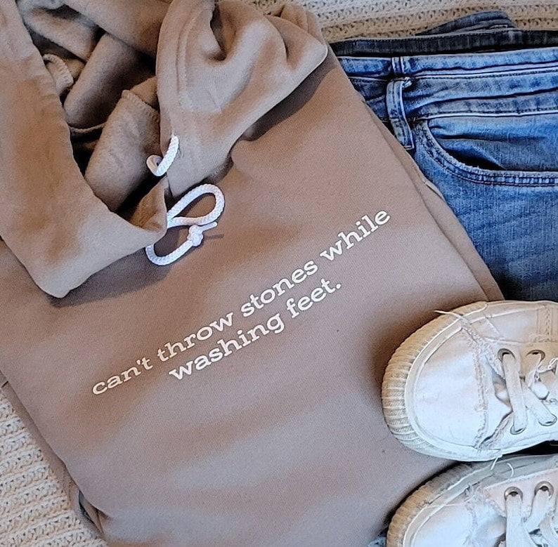 Can't Throw Stones While Washing Feet Hoodie