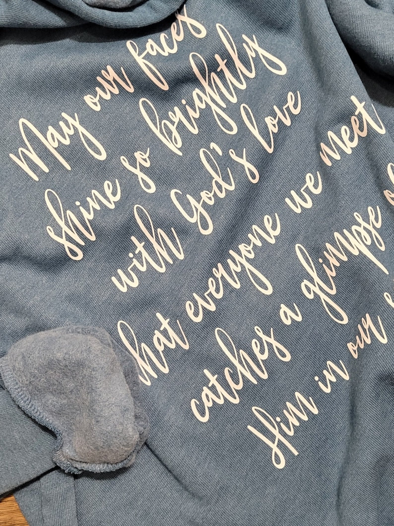 Text on back of sweatshirt